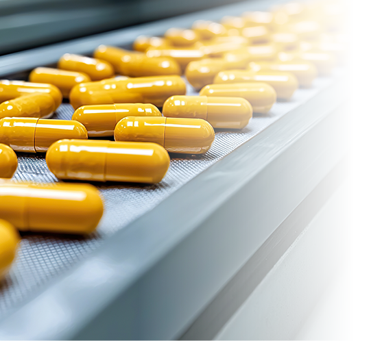 Capsules in conveyor belt
