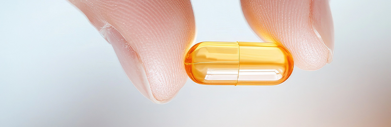 Hand holding Capsule